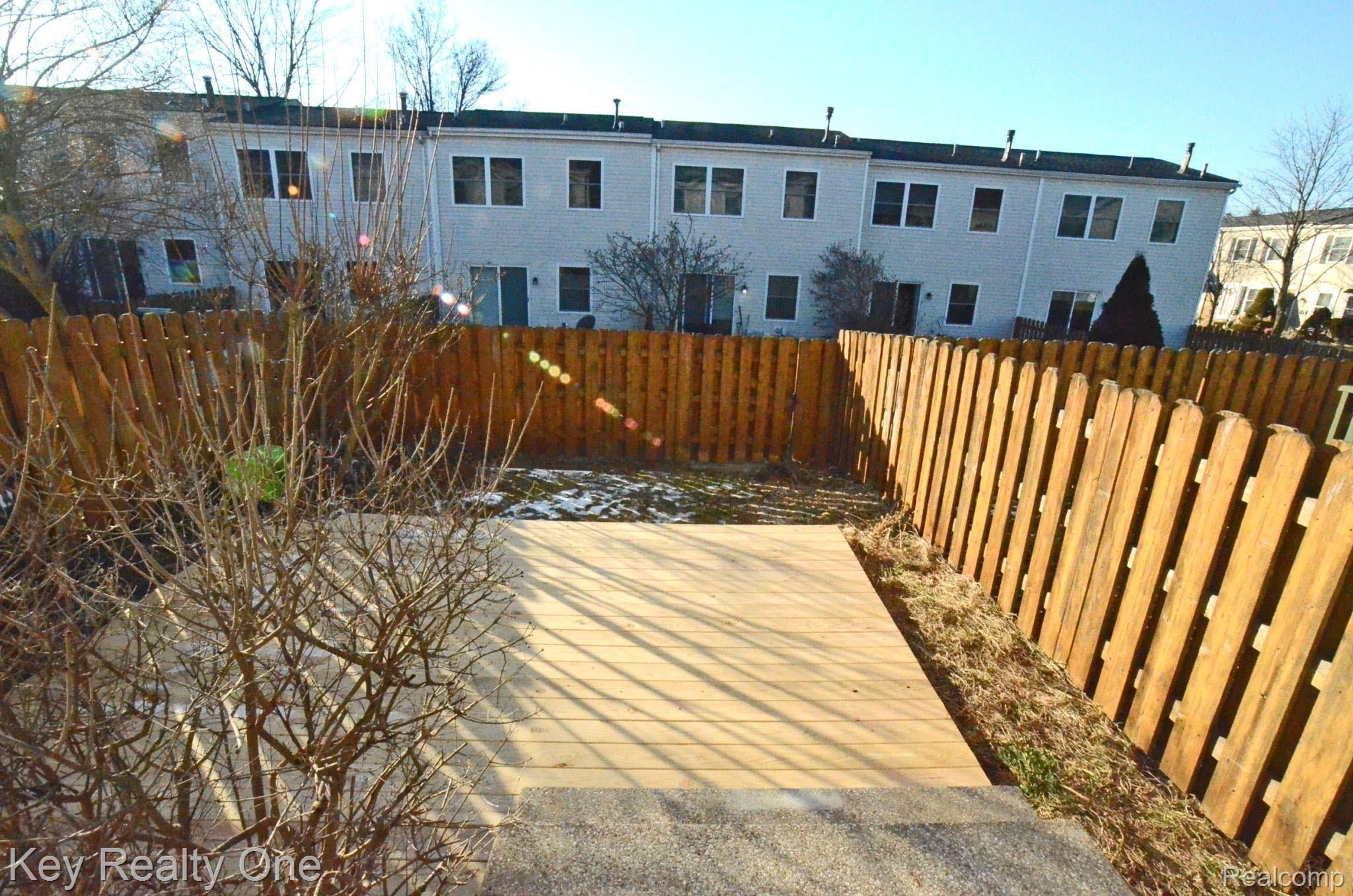 1040 Larson Court Rochester, MI 48307 - Photo 15 of 23 Back Yard and Deck.jpg