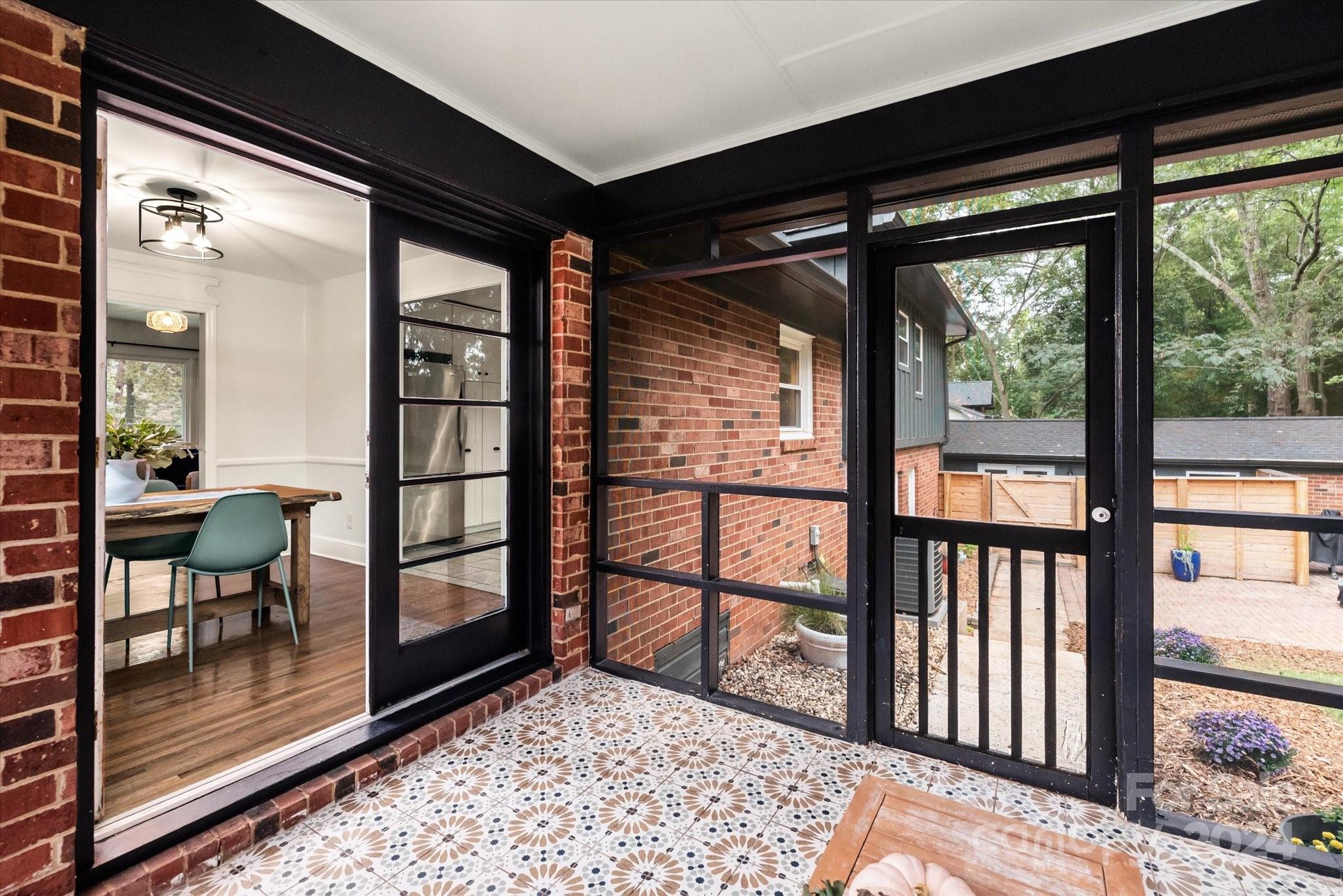 5822 Brookhaven Road Charlotte, NC 28210 - Photo 13 of 48 a view of a large window with wooden floor