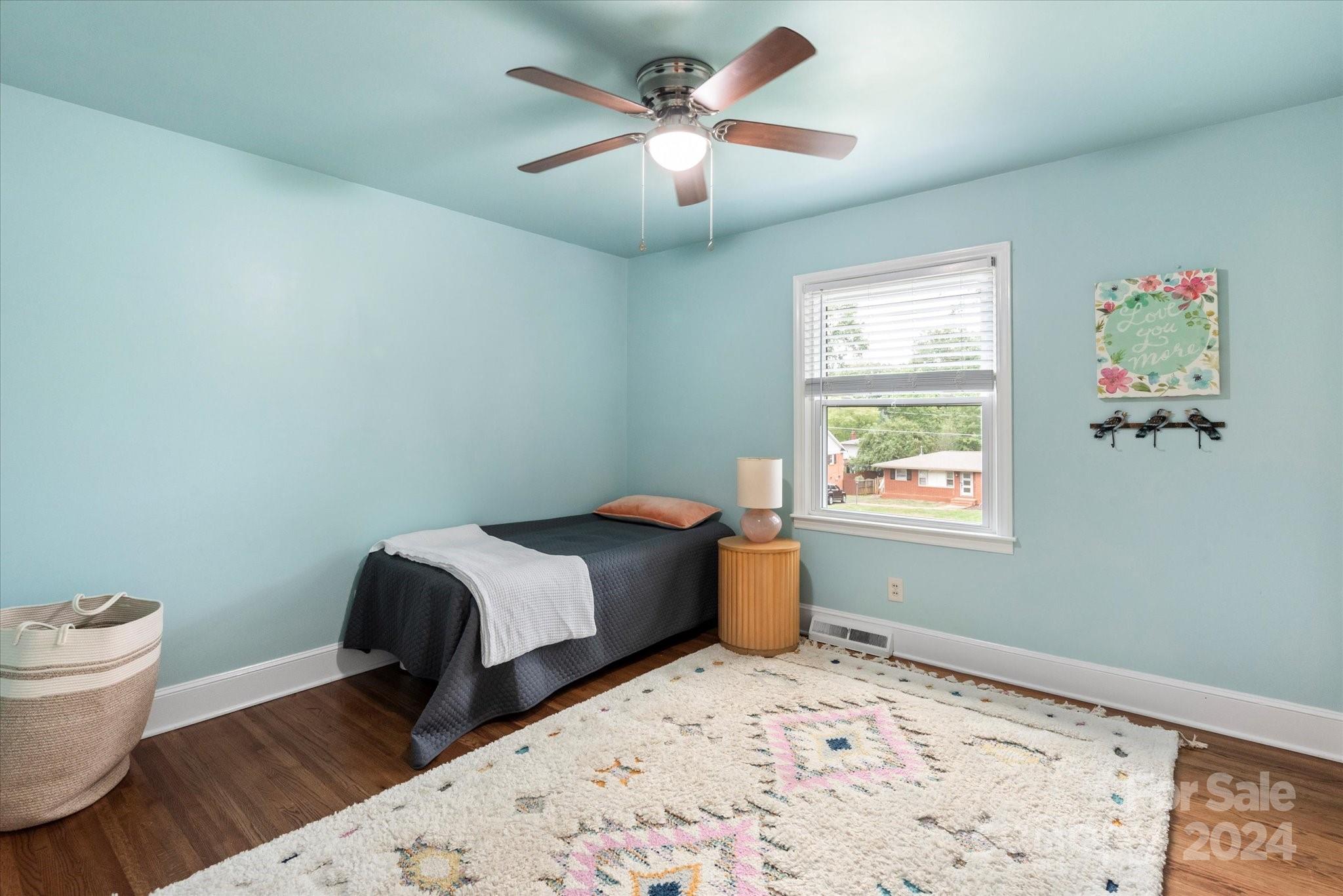 5822 Brookhaven Road Charlotte, NC 28210 - Photo 27 of 48 a bedroom with a bed and a window