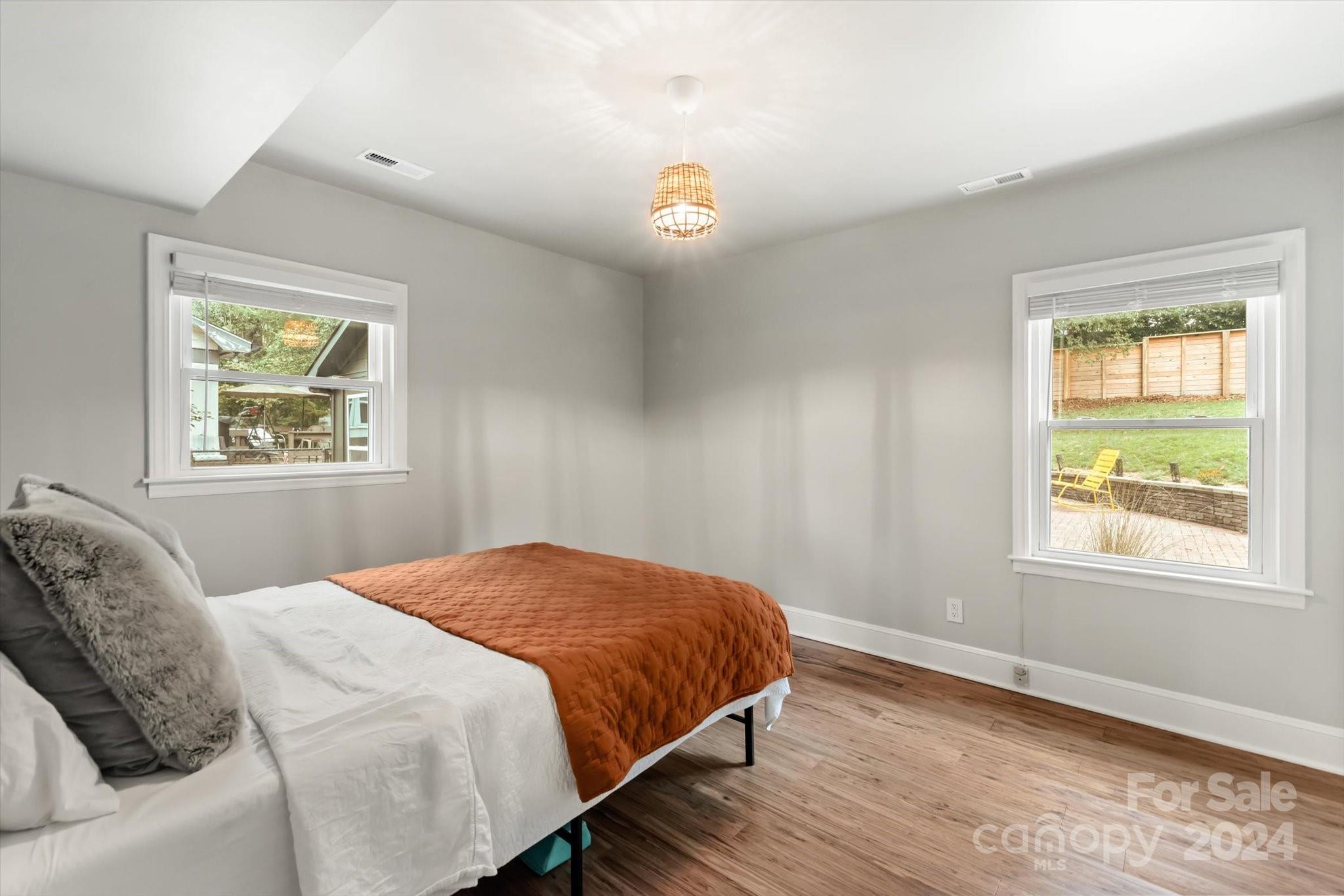 5822 Brookhaven Road Charlotte, NC 28210 - Photo 34 of 48 a bedroom with a bed and a window