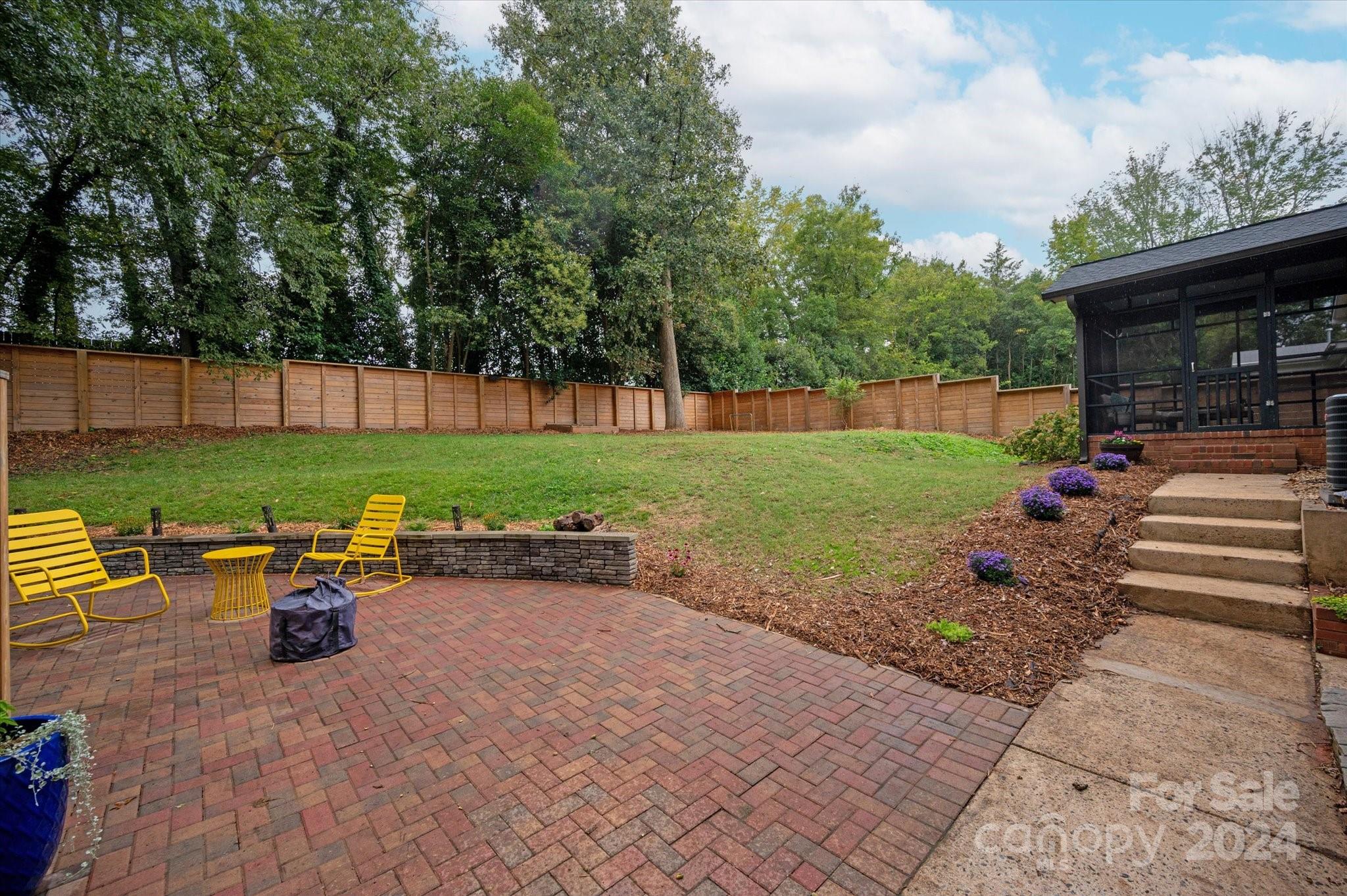 5822 Brookhaven Road Charlotte, NC 28210 - Photo 42 of 48 a garden view with a seating space