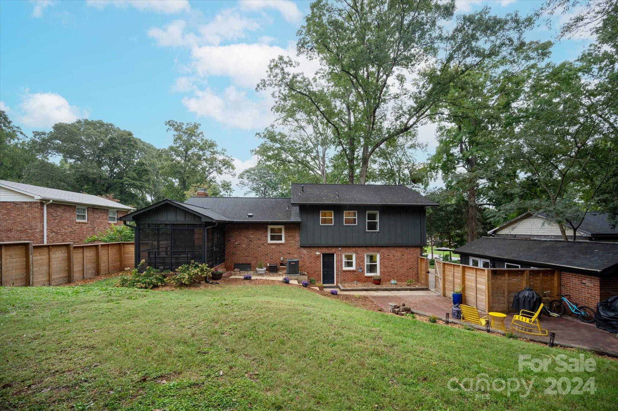 5822 Brookhaven Road Charlotte, NC 28210 - Photo 47 of 48 a front view of a house with garden