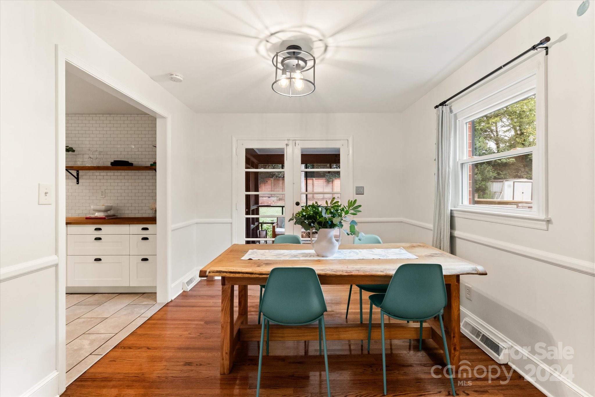 5822 Brookhaven Road Charlotte, NC 28210 - Photo 8 of 48 a view of a dining room with furniture and window
