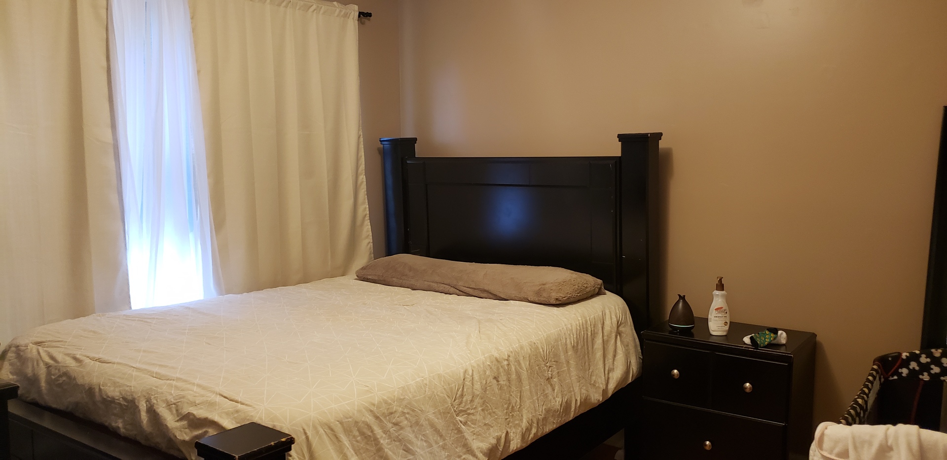 917 East 78th Street, Unit 101W Chicago, IL 60619 - Photo 6 of 8 a bedroom with a bed and a closet
