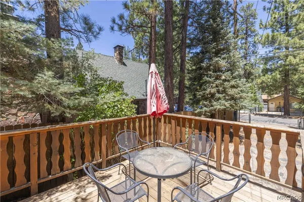 a view of a two chairs on the deck