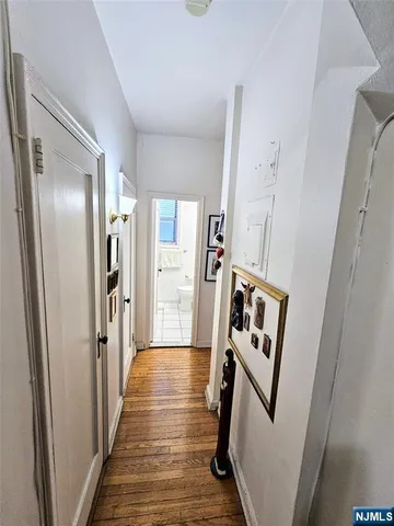 a bathroom with a sink toilet and mirror