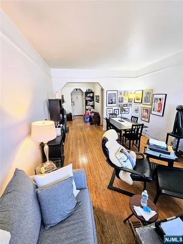 a bed room with furniture and a window