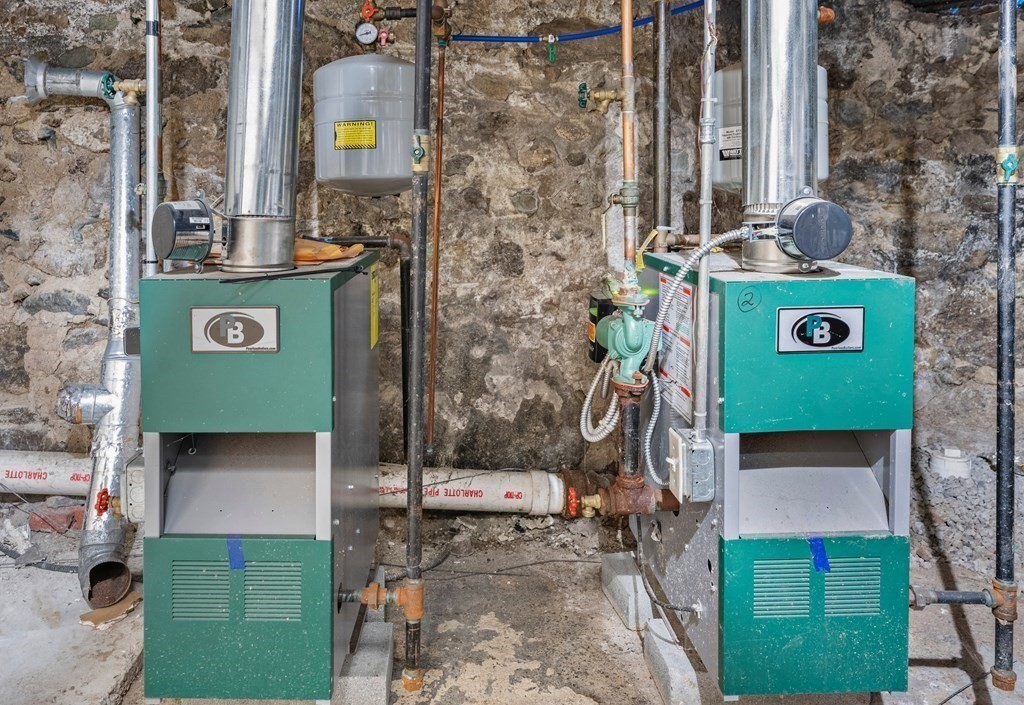 515 R Norfolk Street Boston, MA 02126 - Photo 22 of 26 an aerial view of residential houses with outdoor space