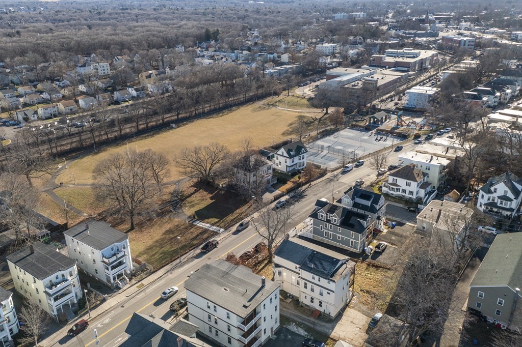 515 R Norfolk Street Boston, MA 02126 - Photo 25 of 26 an aerial view of residential houses with outdoor space