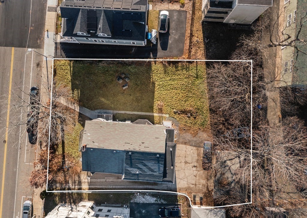515 R Norfolk Street Boston, MA 02126 - Photo 4 of 26 a bathroom with a shower and a sink