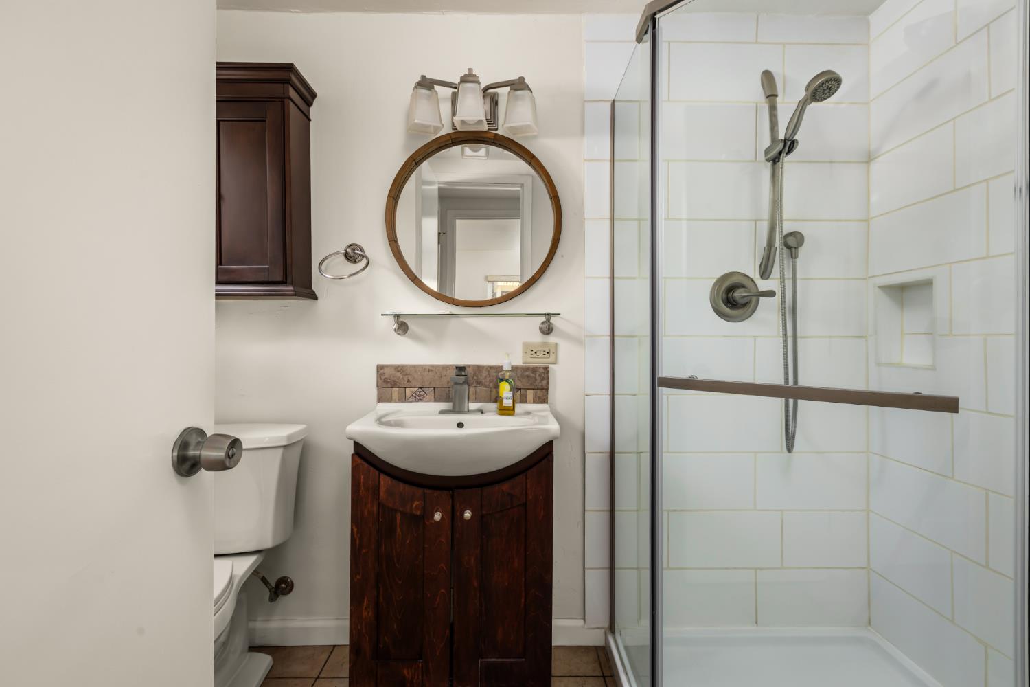 10875 Spenceville Road Penn Valley, CA 95946 - Photo 32 of 49 a bathroom with a sink a toilet and a mirror