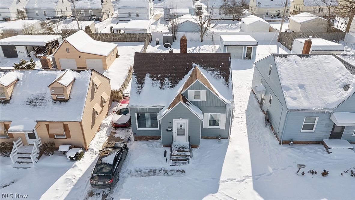5615 Snow Road Parma, OH 44129 - Photo 2 of 39 Snowy aerial view featuring a residential view