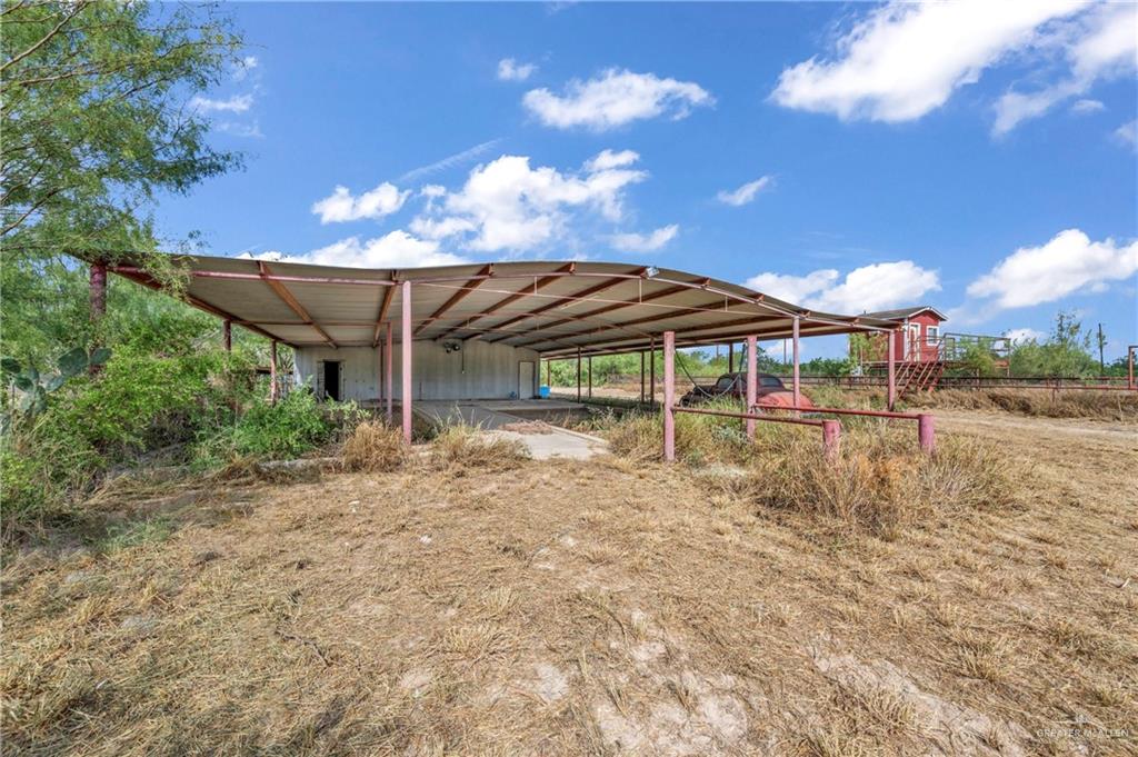 69 Zulema Street Rio Grande City, TX 78582 - Photo 13 of 26 a view of a house with a backyard porch and sitting area
