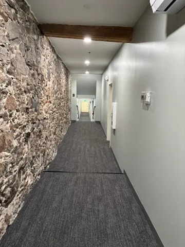 a view of hallway with stairs