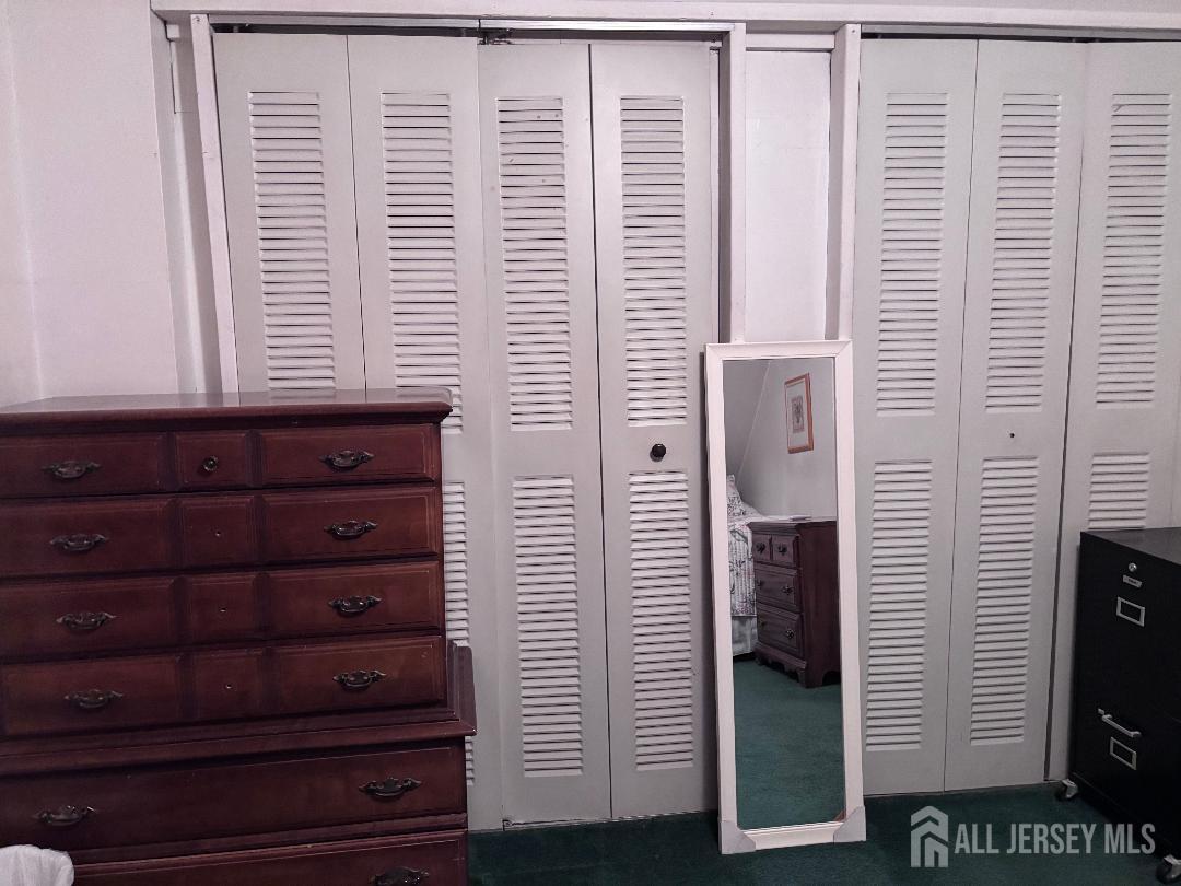 490 Mckeon Street Perth Amboy, NJ 08861 - Photo 20 of 28 a view of a bathroom with a shower
