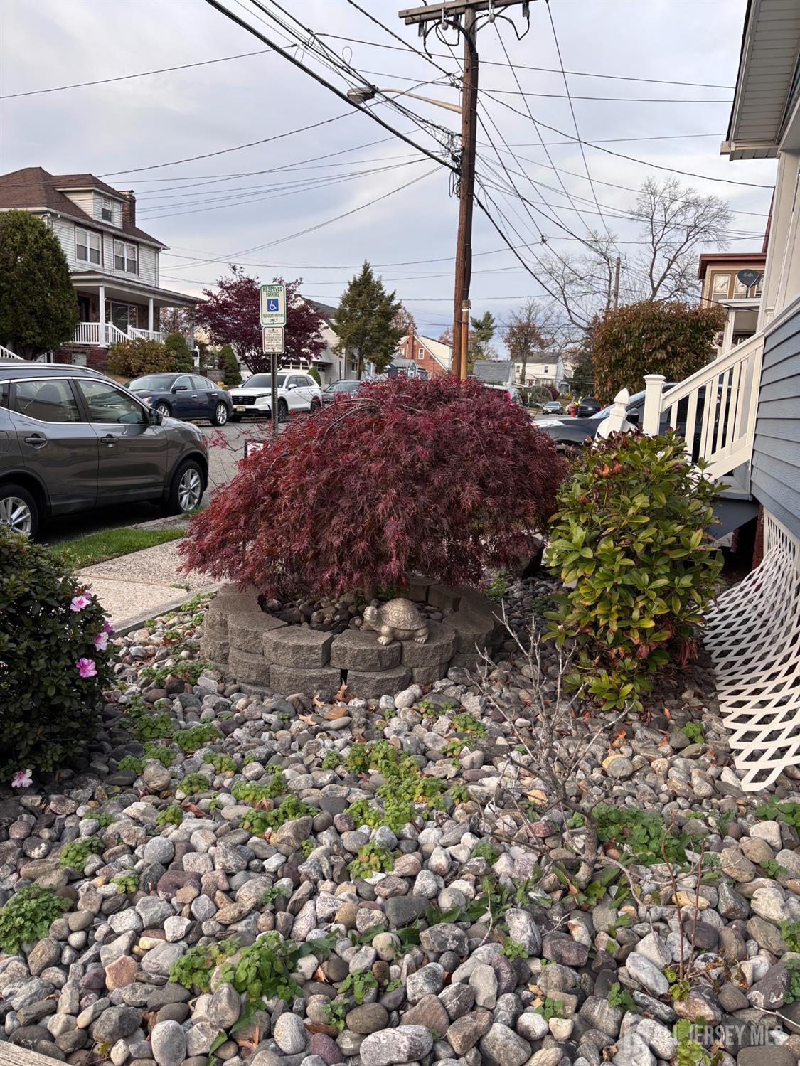 490 Mckeon Street Perth Amboy, NJ 08861 - Photo 2 of 28 a view of a street with some cars parked on road