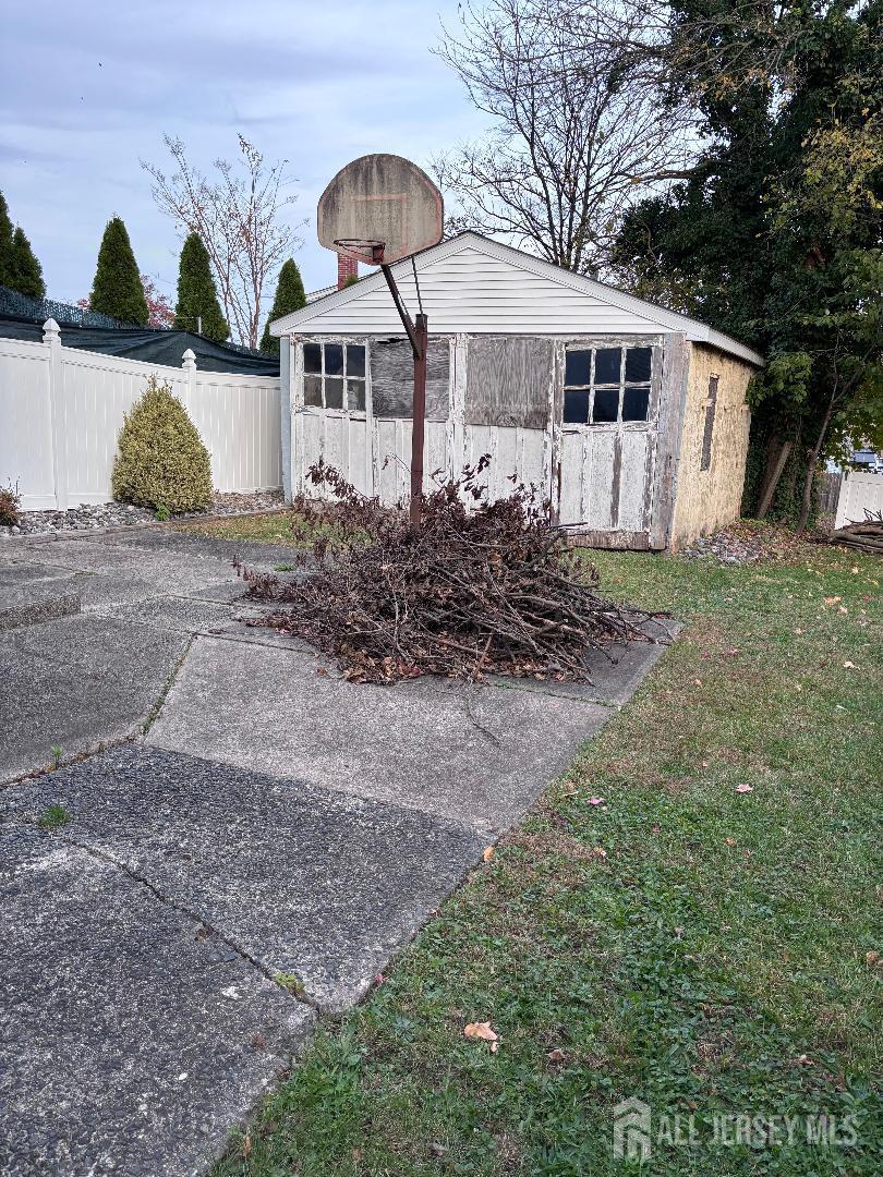490 Mckeon Street Perth Amboy, NJ 08861 - Photo 27 of 28 a front view of a house with garden