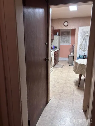 a living room with furniture and a gate