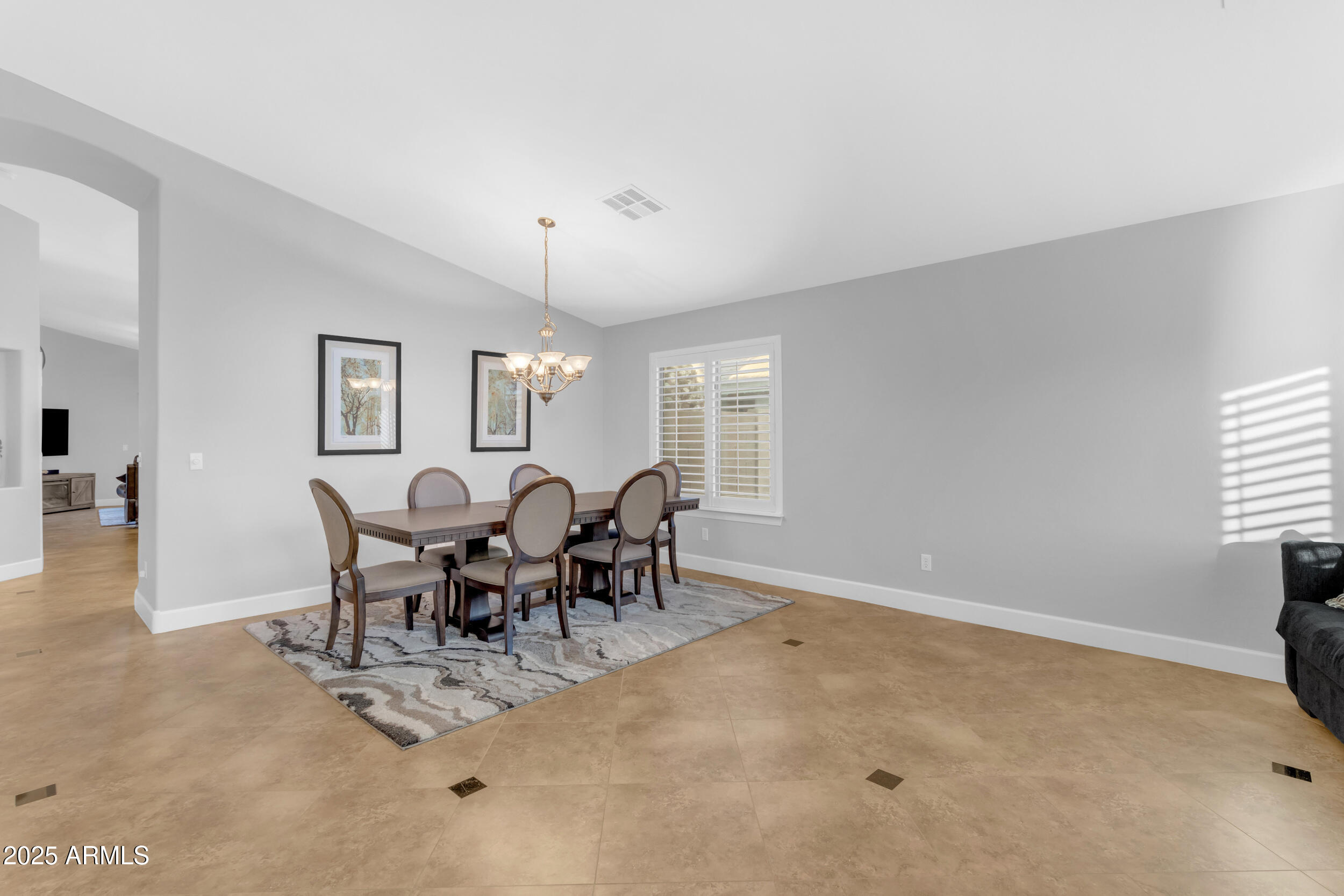13438 West Redfield Road Surprise, AZ 85379 - Photo 11 of 75 a view of a dining room with furniture