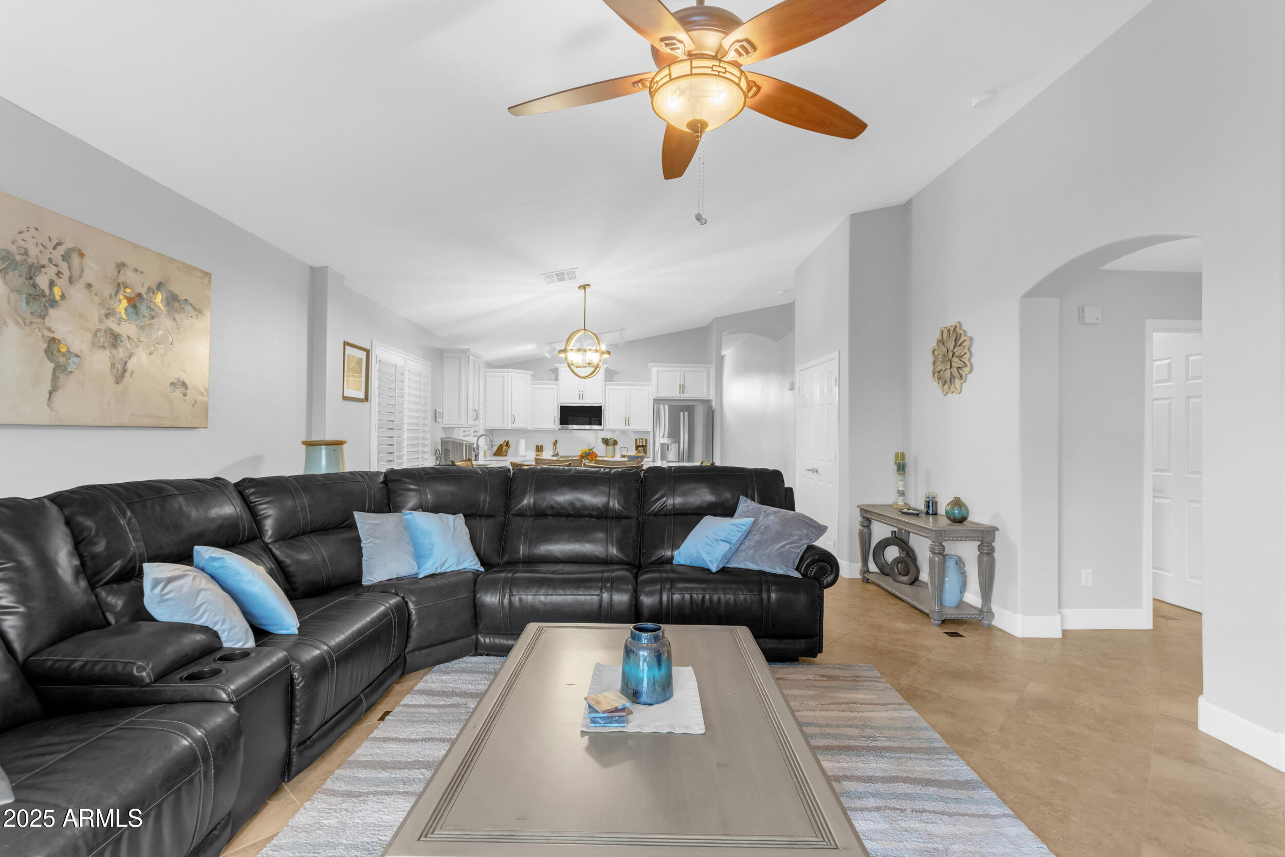13438 West Redfield Road Surprise, AZ 85379 - Photo 33 of 75 a living room with furniture and a large window