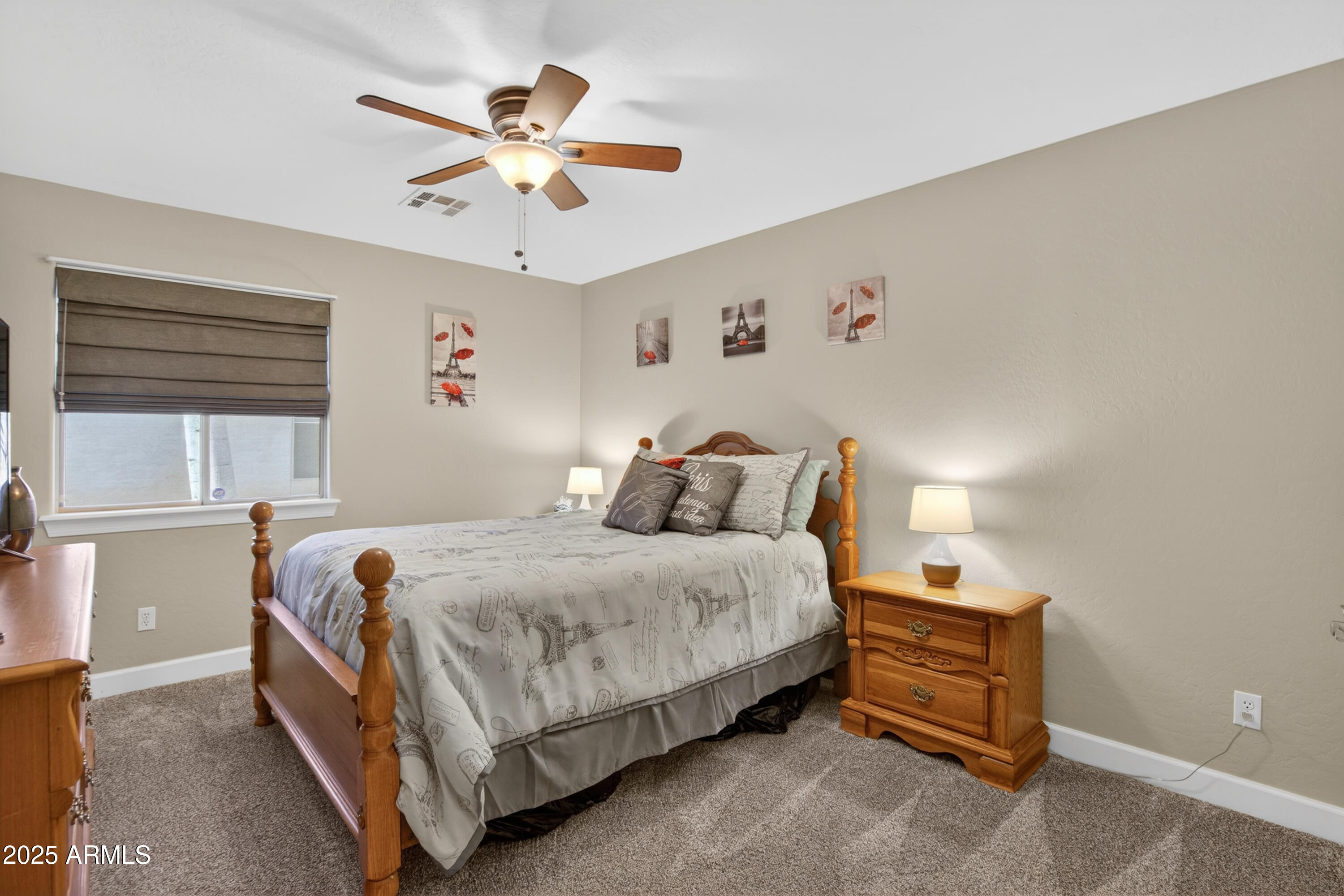 13438 West Redfield Road Surprise, AZ 85379 - Photo 47 of 75 a bedroom with a bed and window