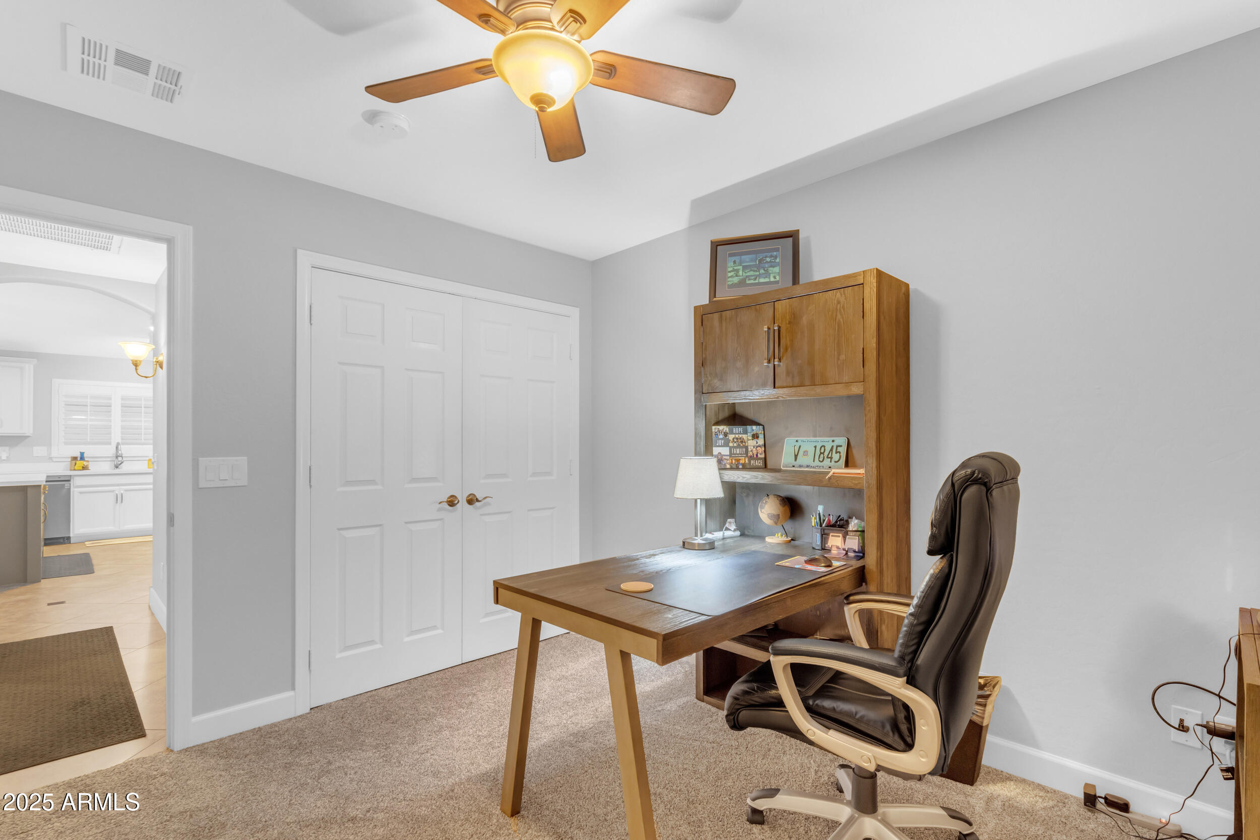 13438 West Redfield Road Surprise, AZ 85379 - Photo 55 of 75 a view of a workspace with furniture