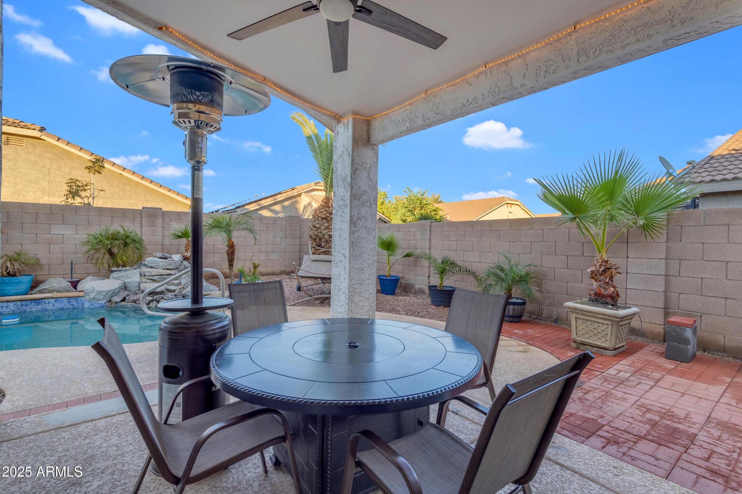 13438 West Redfield Road Surprise, AZ 85379 - Photo 58 of 75 a view of a dining room with furniture window and outside view