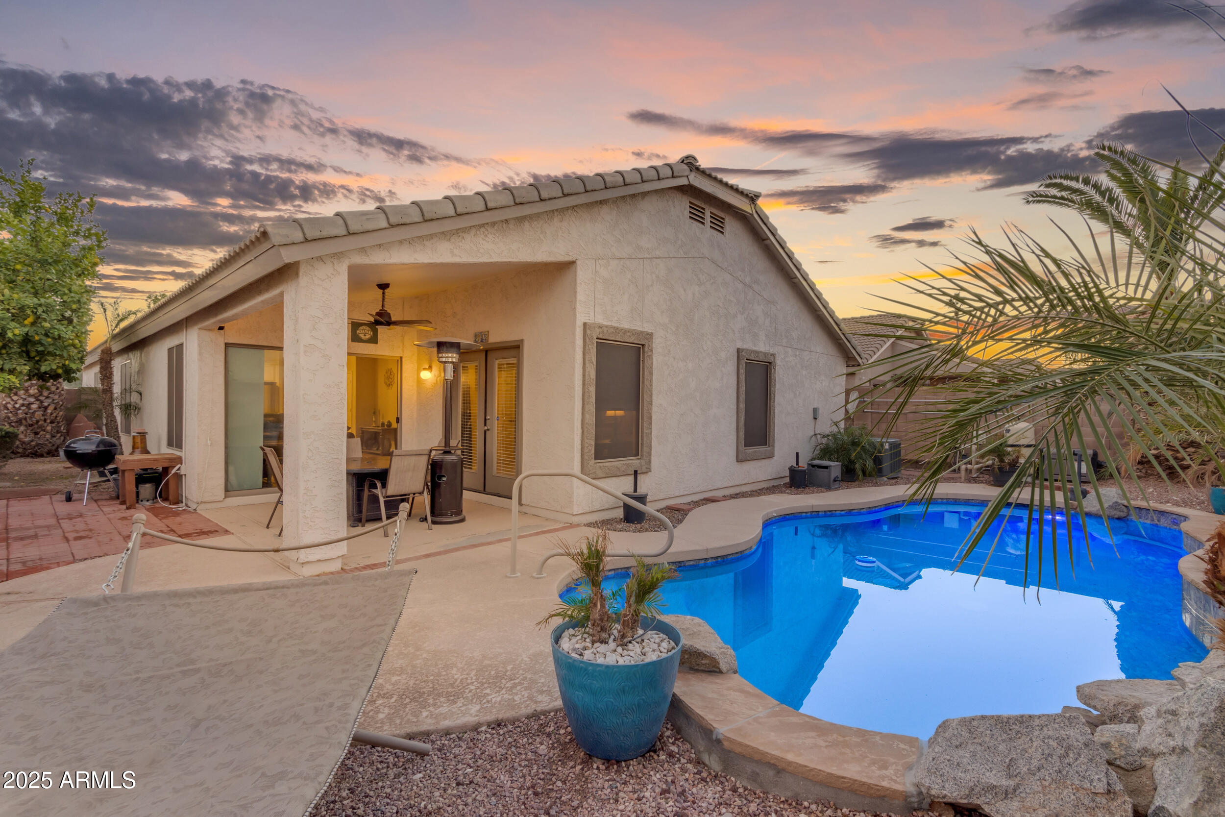 13438 West Redfield Road Surprise, AZ 85379 - Photo 4 of 75 a view of a house with patio