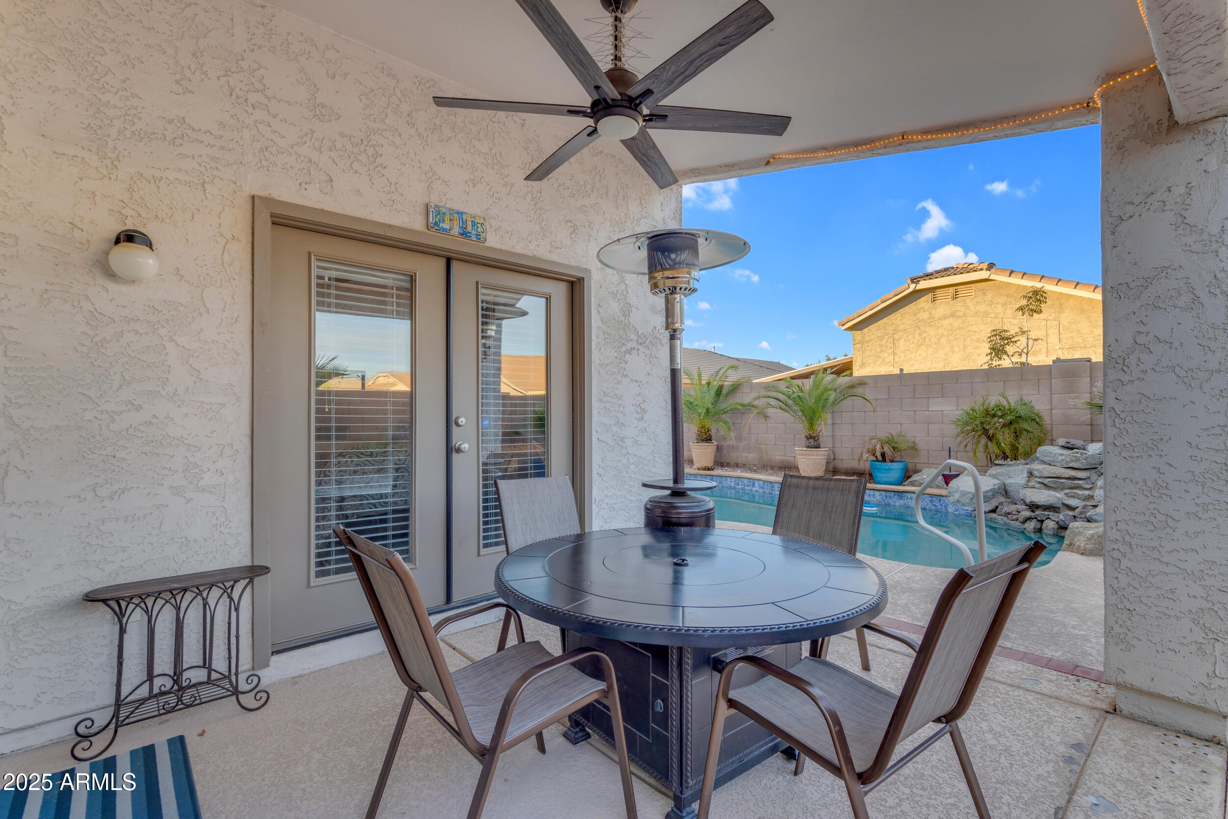 13438 West Redfield Road Surprise, AZ 85379 - Photo 59 of 75 a view of a dining room with furniture window and outside view