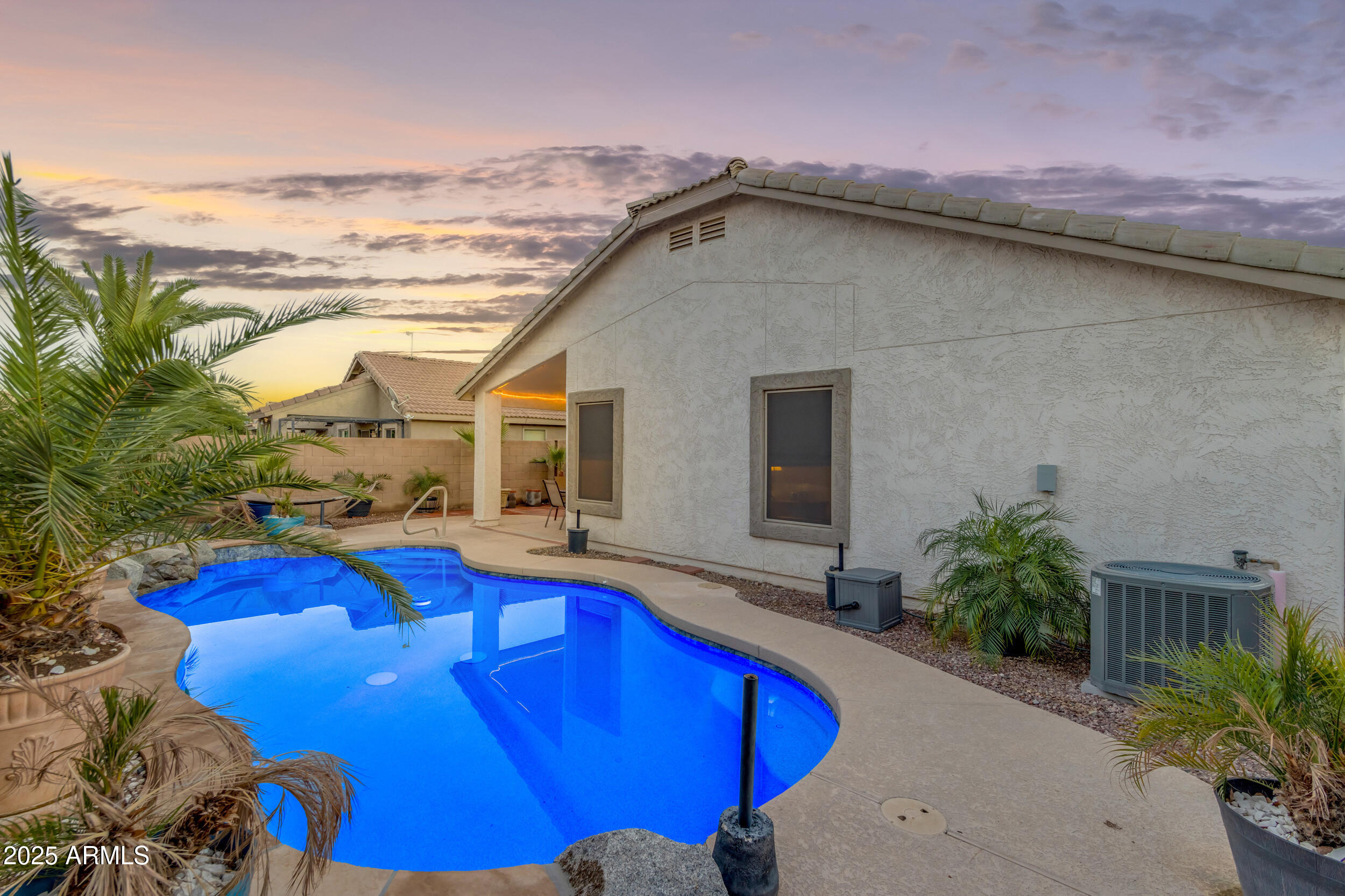 13438 West Redfield Road Surprise, AZ 85379 - Photo 72 of 75 a view of a house with a swimming pool
