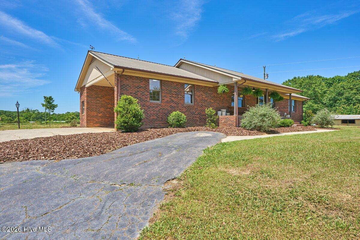 216 Phillips Road Bennett, NC 27208 - Photo 8 of 46 Drive Up View
