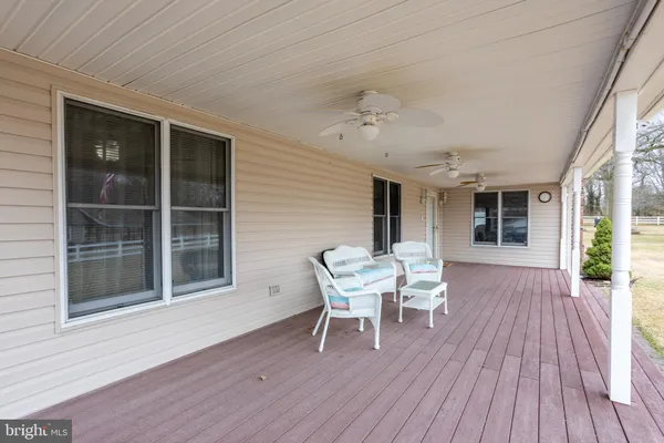 a patio with table and chairs