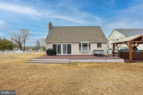 a view of swimming pool with outdoor seating and yard