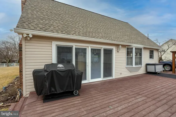 a front view of a house with seating space