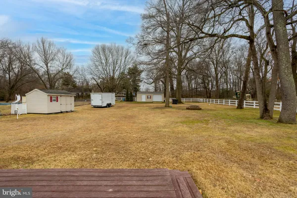 a house with trees in front of it