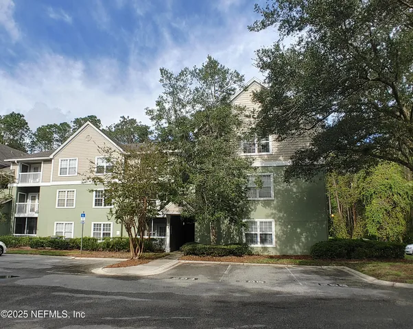 a front view of residential houses with street