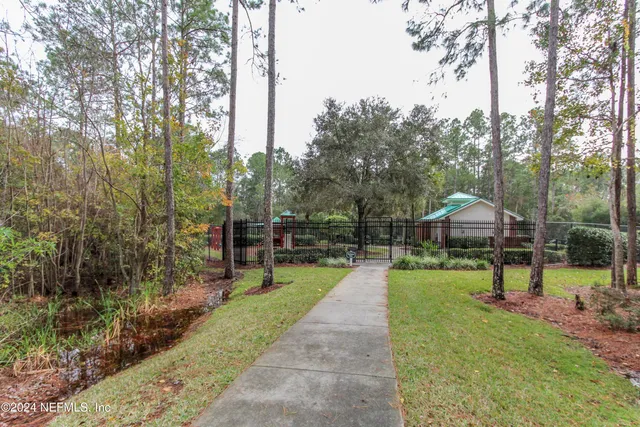 a view of a livingroom with furniture and a furniture