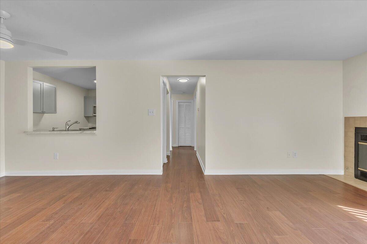 1444 Woodview Drive, Unit 7 Crown Point, IN 46307 - Photo 5 of 15 a view of an empty room and wooden floor and a window