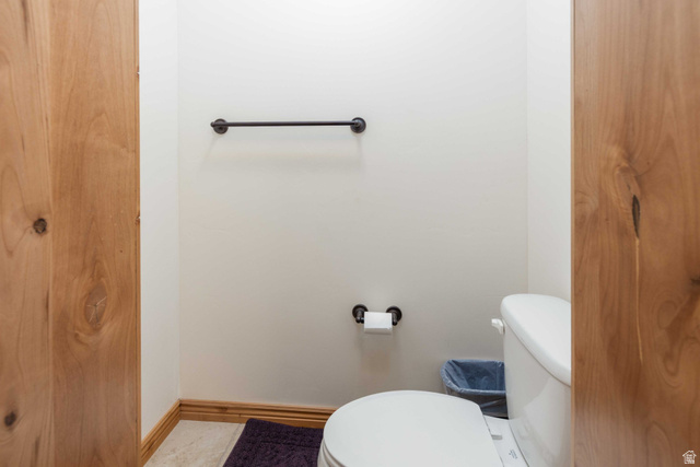 5168 Fairview Loop, Unit C604 Eden, UT 84310 - Photo 33 of 53 Bathroom with toilet and baseboards
