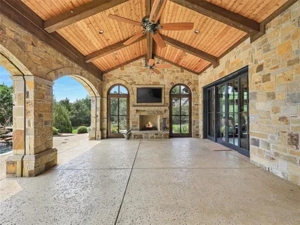 a view of swimming pool with outdoor seating