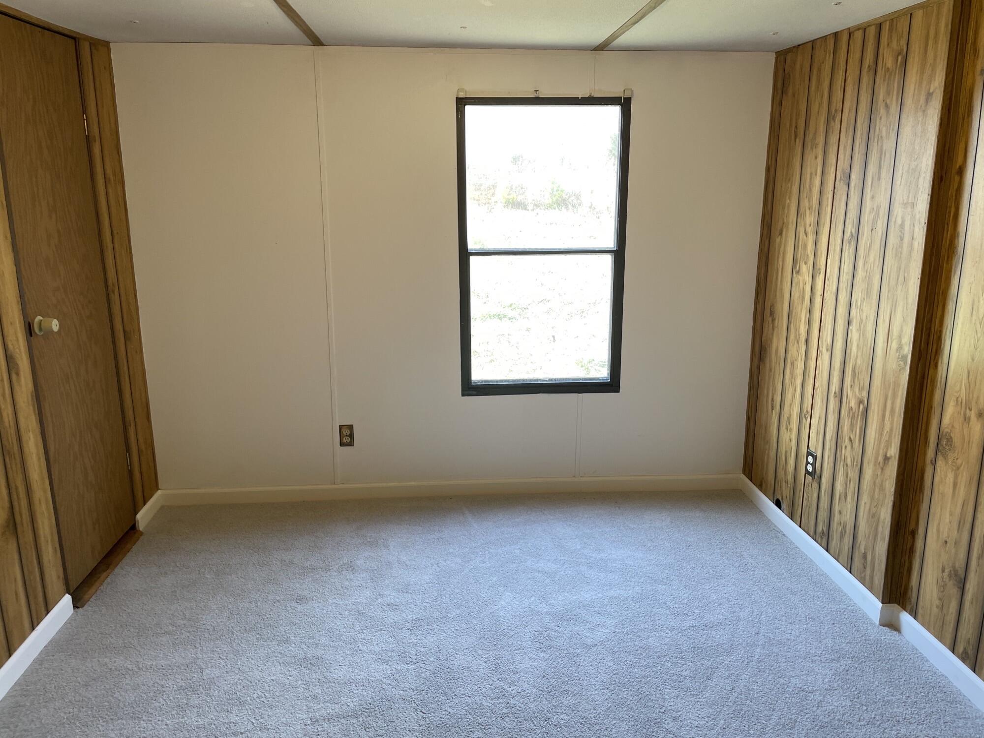 3163 North Fork Road Elliston, VA 24087 - Photo 5 of 10 an empty room with a window