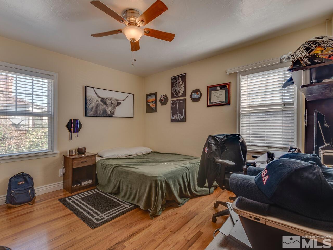 1061 Whitaker Drive Reno, NV 89503 - Photo 11 of 20 a bedroom with furniture and a window