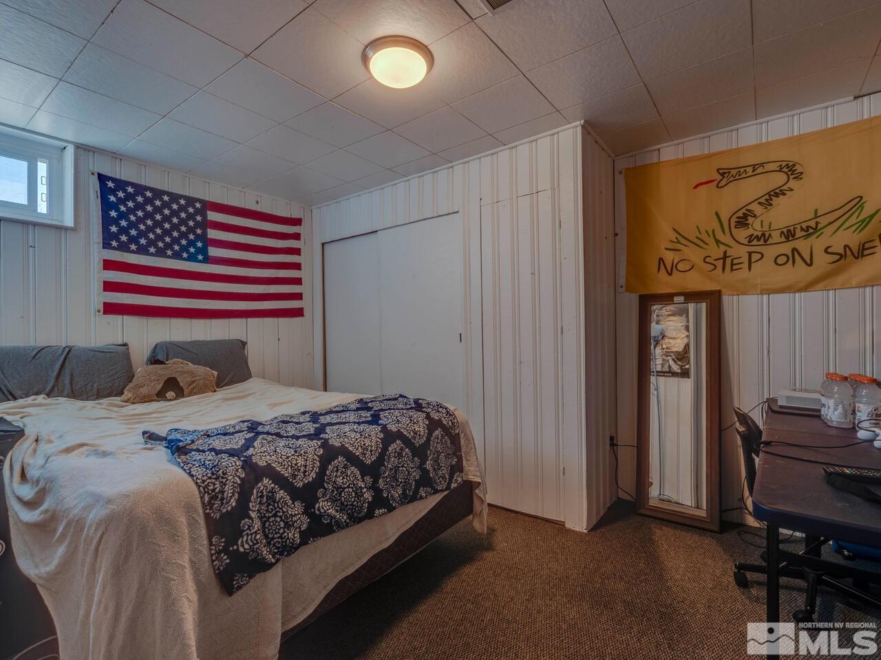 1061 Whitaker Drive Reno, NV 89503 - Photo 18 of 20 a bedroom with a bed and dresser