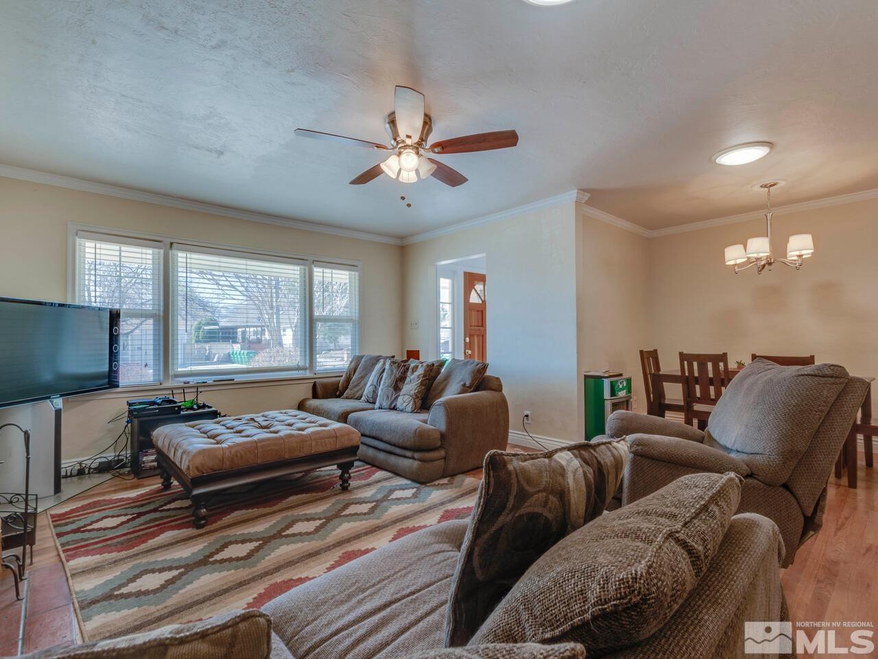 1061 Whitaker Drive Reno, NV 89503 - Photo 6 of 20 a living room with furniture and a flat screen tv