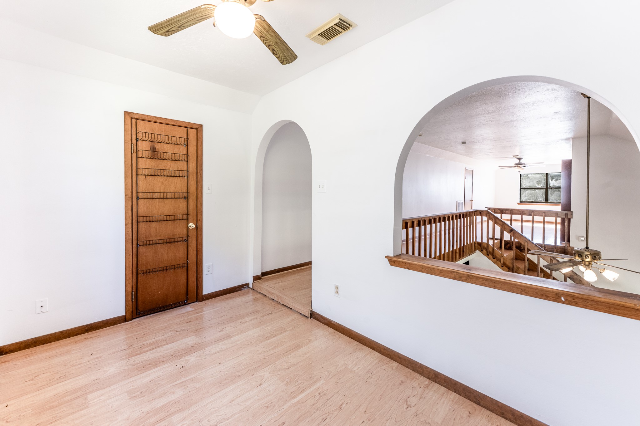 191 Timber Bay Drive Trinity, TX 75862 - Photo 24 of 48 Looking from upstairs office area to loft and multi-purpose room.
