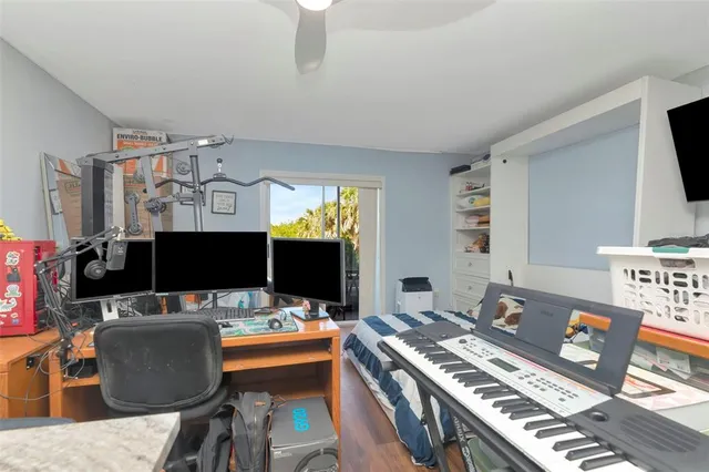 a room with furniture and a flat screen tv