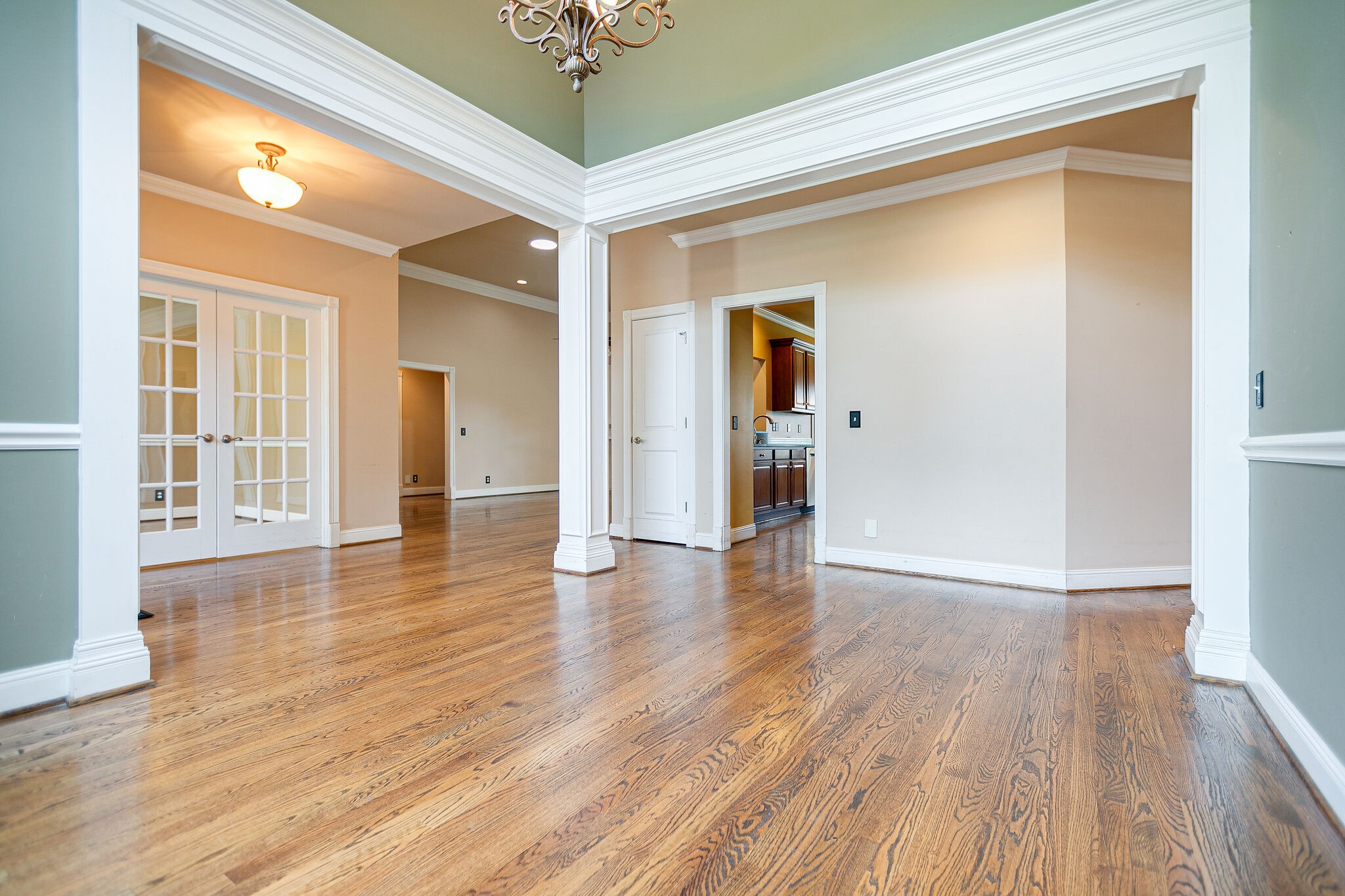 1613 Fair House Road Spring Hill, TN 37174 - Photo 8 of 26 a view of an empty room with wooden floor and a window