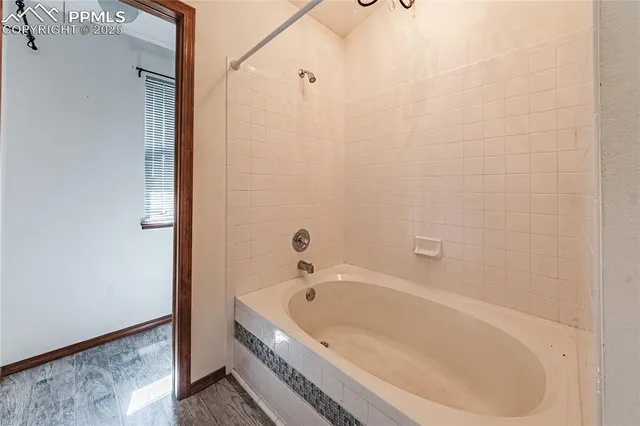 a bathroom with a bathtub