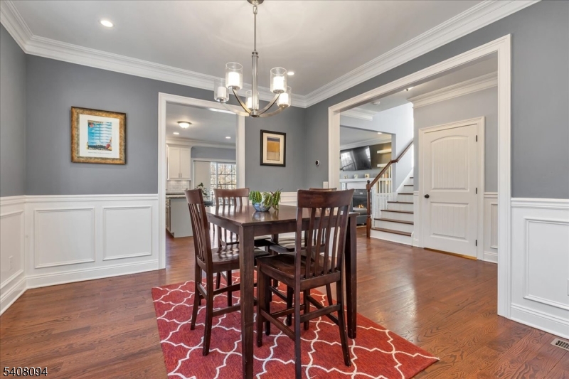 177 Maple Street Bridgewater, NJ 08807 - Photo 11 of 37 a view of a dining room with furniture and chandelier