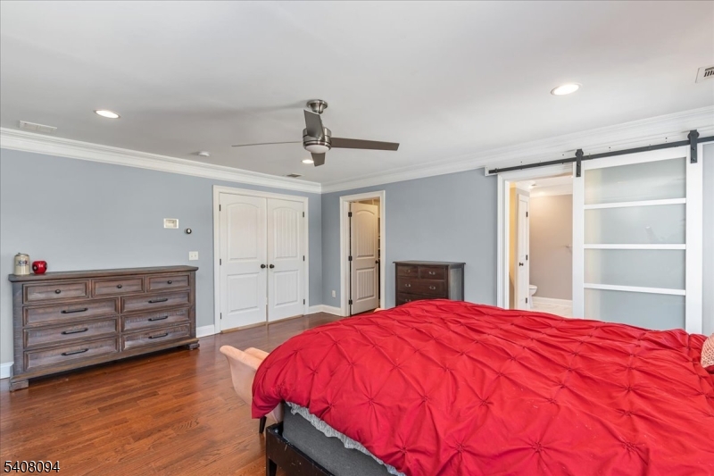 177 Maple Street Bridgewater, NJ 08807 - Photo 18 of 37 a spacious bedroom with a bed and a dresser